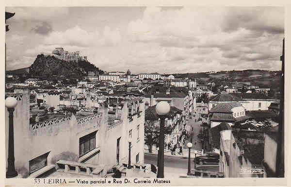 N 33 - Leiria. Vista parcial e rua Dr. Correia Mateus - Col. Passaporte - Dim. 14x9 cm. - Col. Dulce Gabriel